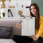 full-shot-woman-making-list-with-clipboard_23-2149321563