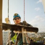 industrial-mountaineering-worker-hangs-residential-building-while-washing-exterior-facade-glazing-rope-access-laborer-hangs-wall-house-concept-urban-works-copy-space_289152-4214