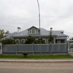 old-russian-yellow-wooden-house_384690-348